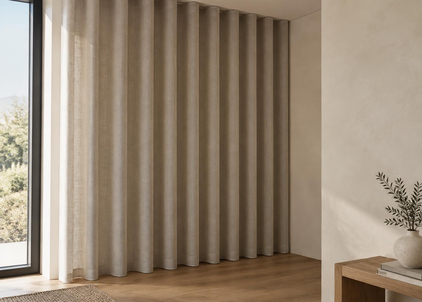 Detalle de cortinas a medida con onda y visillos